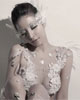 Người mẫu Đài Loan dán lông ngỗng thành áo cưới